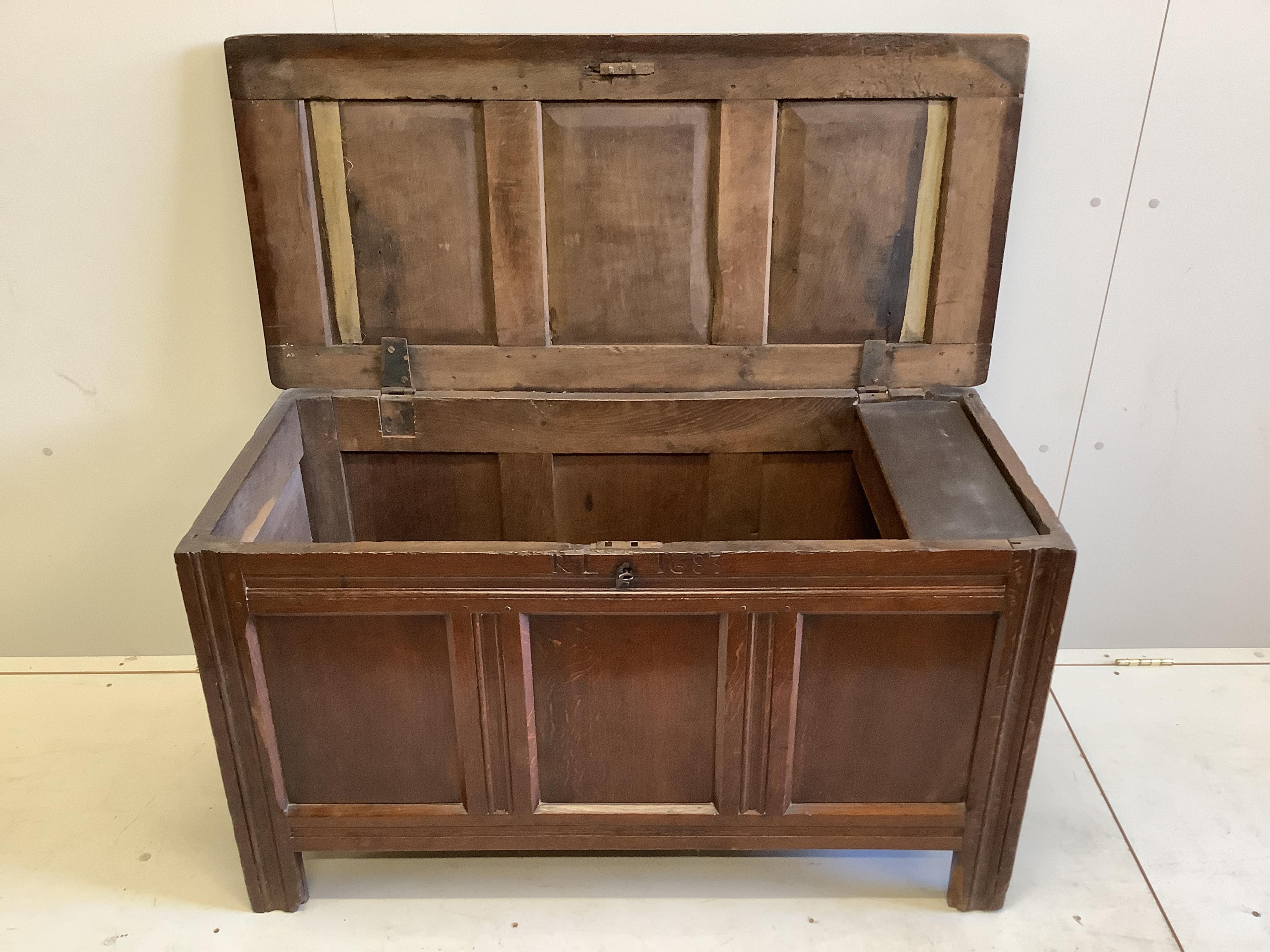 A Charles II oak coffer, dated 1683, width 117cm, depth 54cm, height 65cm. Condition - fair